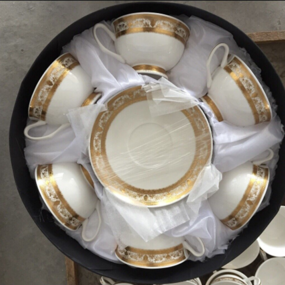 Tea cups and saucers made of new bone china with gold trim. Twelve Pieces for Six People.