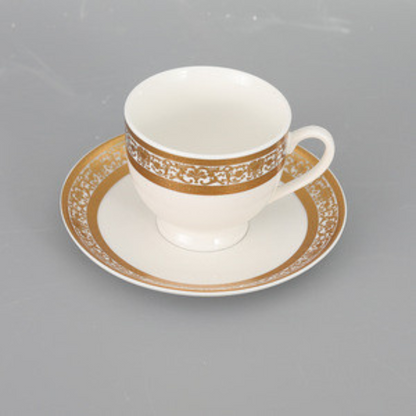 Tea cups and saucers made of new bone china with gold trim. Twelve Pieces for Six People.