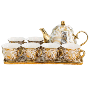 14 piece white and gold ceramic tea set with pot and cups