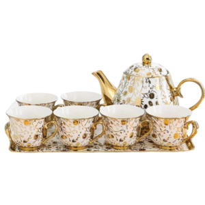 14 piece white and gold ceramic tea set with pot and cups