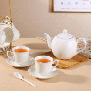 19 piece white and gold tea set with pot, cups and stand