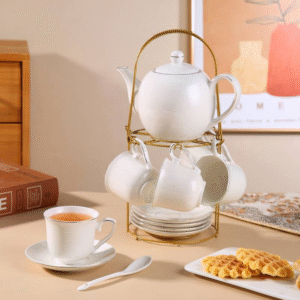 19 piece white and gold tea set with pot, cups and stand