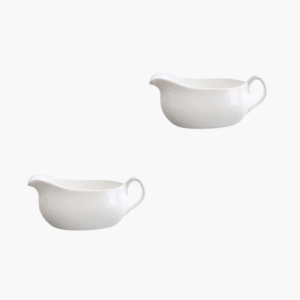Set of 2 white porcelain gravy boats with handles