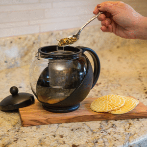 Half moon glass teapot with detachable stainless steel infuser