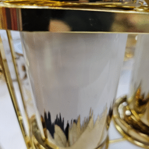 Two cup kitchen utensil holder with golden metal frame
