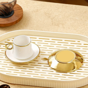Six white and gold ceramic tea cups and saucers in a gift box