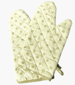 Beige polka oven mitts with quilted cotton lining