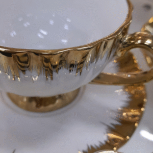 White and gold tea set of 6 ceramic cups with saucers