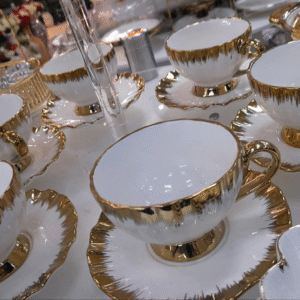 White and gold tea set of 6 ceramic cups with saucers