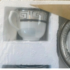 Porcelain tea coffee cups set with teapot and saucers