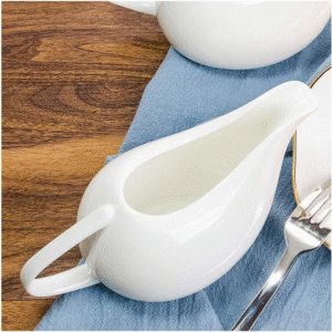 White ceramic kitchen jug and sauce server with handle