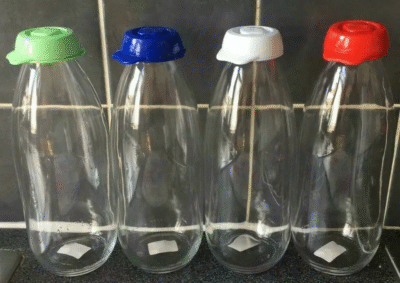 Pack of 3 one litre glass milk bottles with lids