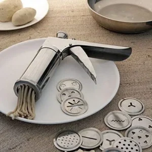 Hand operated kitchen press maker with snack moulds and discs