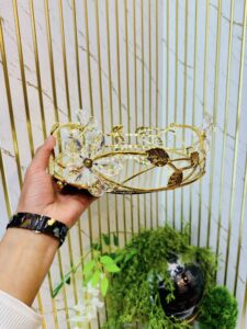Round gold-toned mirrored decorative serving tray