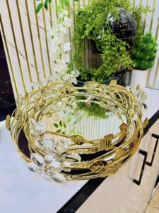 Round gold-toned mirrored decorative serving tray